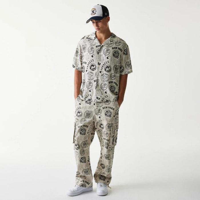 The Male model is wearing MLB Subway Series All Over Print Open White Short Sleeve Shirt 8