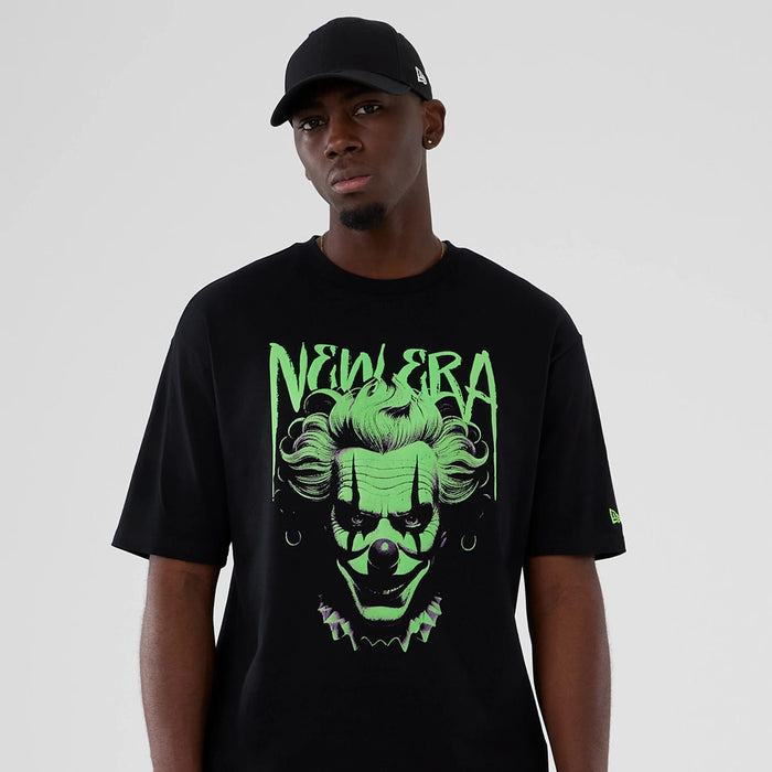 The Male model is wearing New Era Halloween Clown Graphic Black Oversized T-Shirt 7