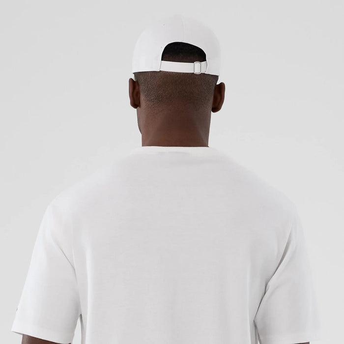 The Male model is wearing New Era Halloween Skull Graphic White Oversized T-Shirt 7