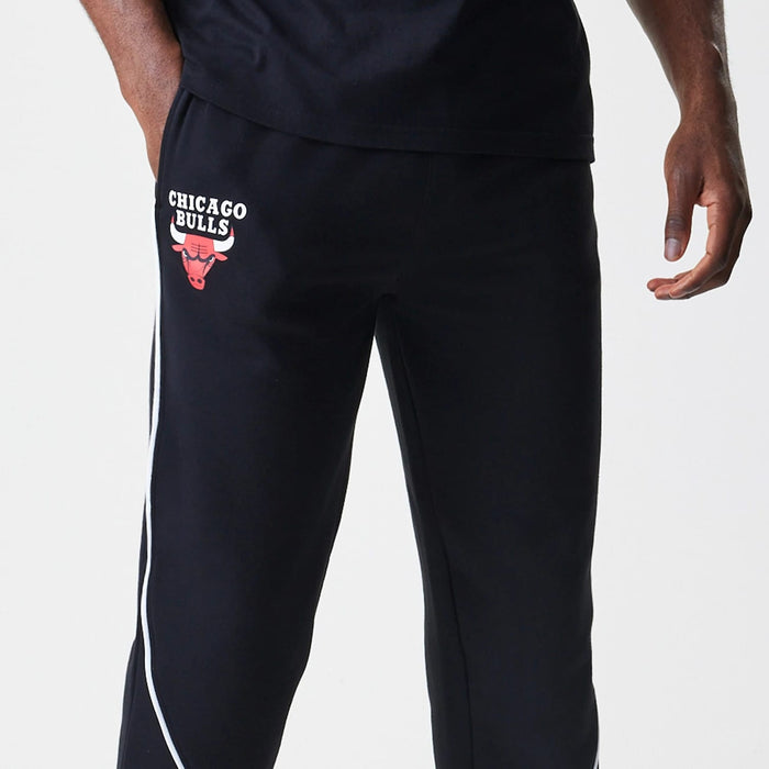 The Male model is wearing Chicago Bulls NBA Piping Navy Joggers 5