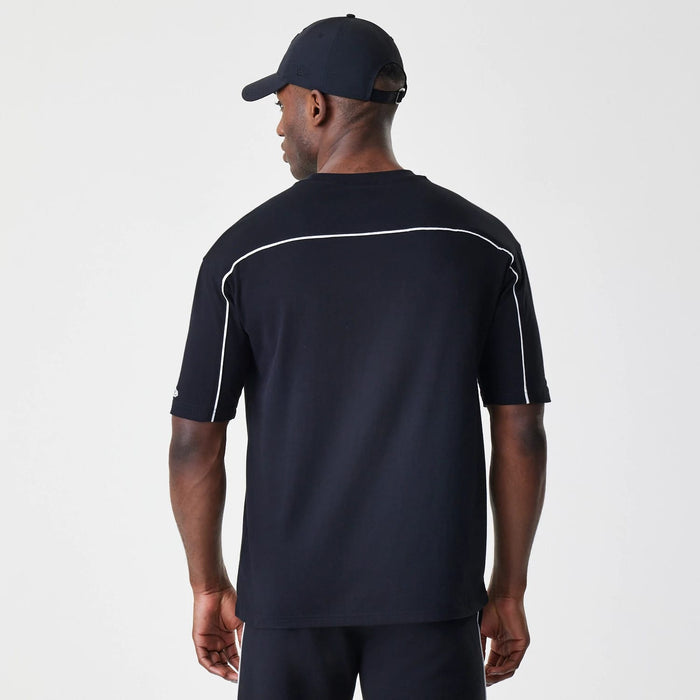 The Male model is wearing Chicago Bulls NBA Piping Black Oversized T-Shirt 2