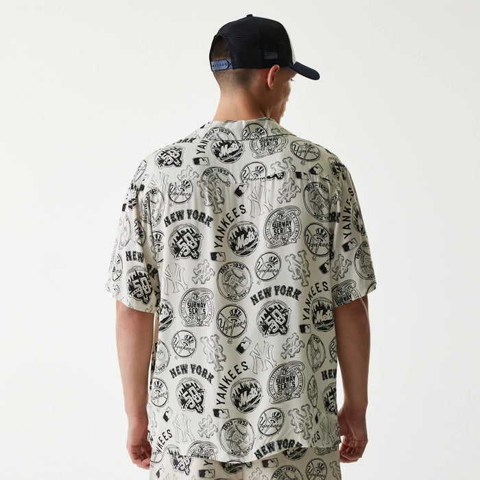 The Male model is wearing MLB Subway Series All Over Print Open White Short Sleeve Shirt 2