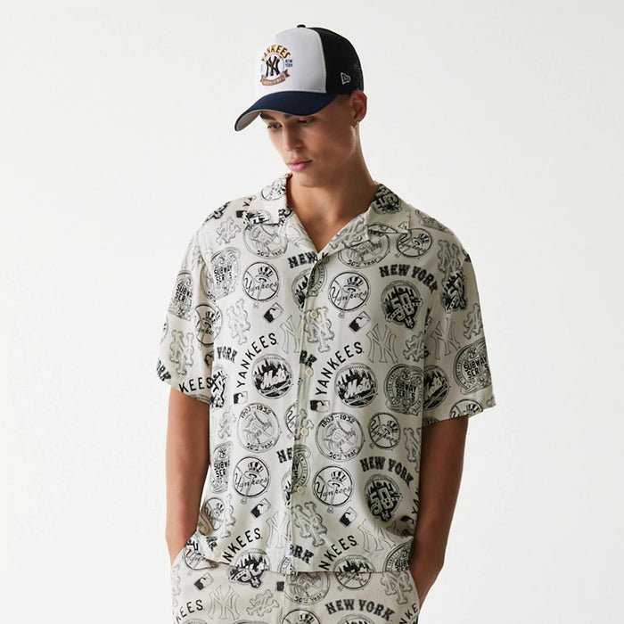 The Male model is wearing MLB Subway Series All Over Print Open White Short Sleeve Shirt 6