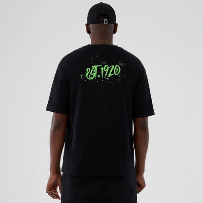 The Male model is wearing  New Era Halloween Clown Graphic Black Oversized T-Shirt 2