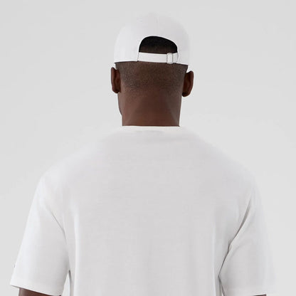The Male model is wearing  New Era Halloween Skull Graphic White Oversized T-Shirt 7