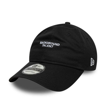 This is a  New Era Slogan Background Talent Black 9TWENTY Adjustable Cap 1