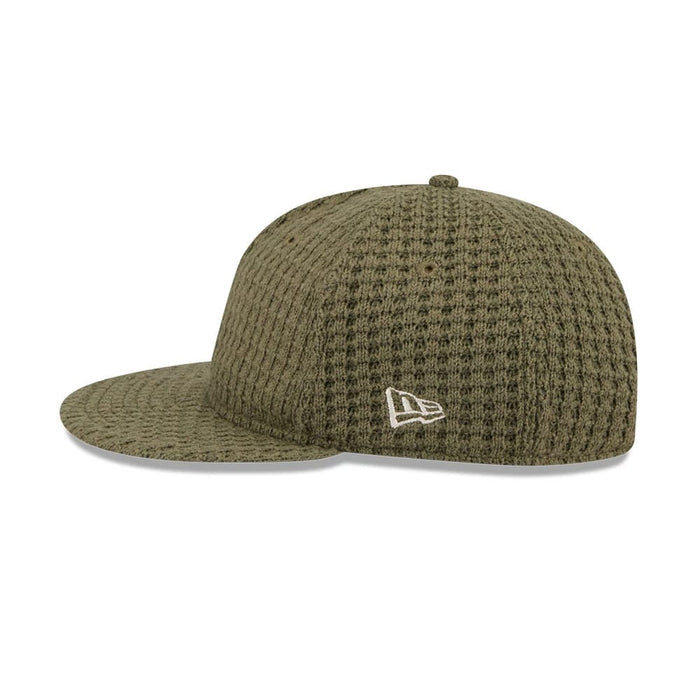 This is a  New Era Waffle Knit Green Retro Crown 9FIFTY Adjustable Cap 6