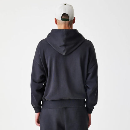 The Male model is wearing  New Era Washed Black Oversized Full Zip Hoodie 2