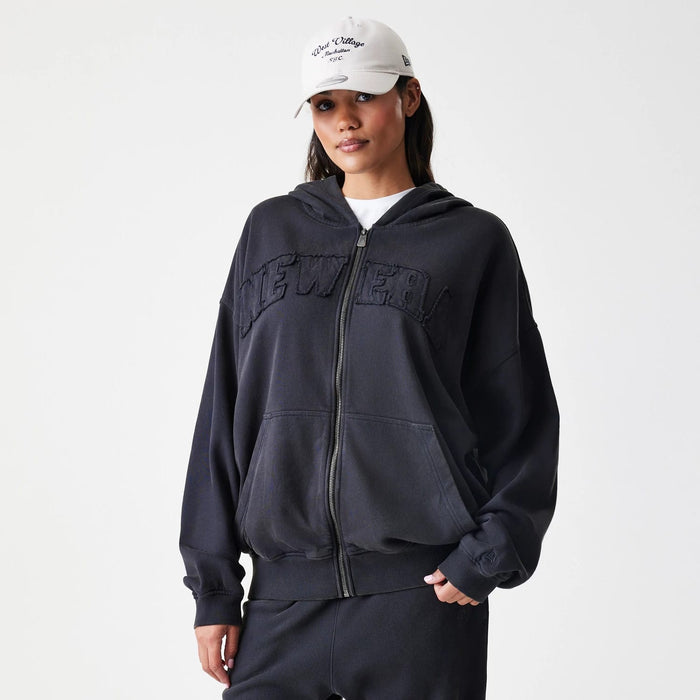 The Male model is wearing  New Era Washed Black Oversized Full Zip Hoodie 4