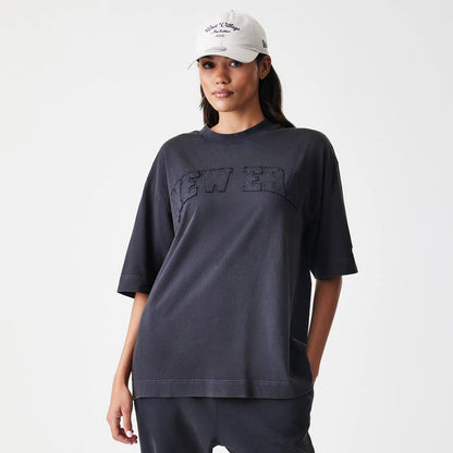 The Male model is wearing  New Era Washed Black Oversized T-Shirt 4