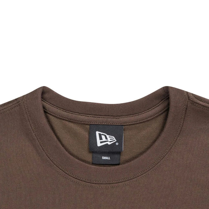 The model is wearing this New Era Year Of The Horse T-Shirt in brown. 5