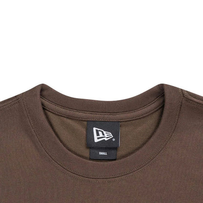 The model is wearing this New Era Year Of The Horse T-Shirt in brown. 5