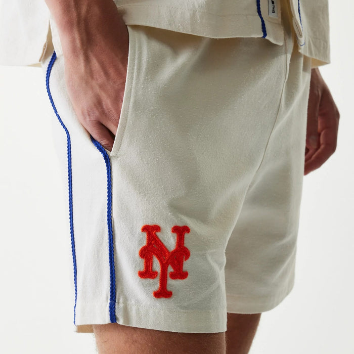 The Male model is wearing New York Mets MLB Piping Open Cream Shorts 3