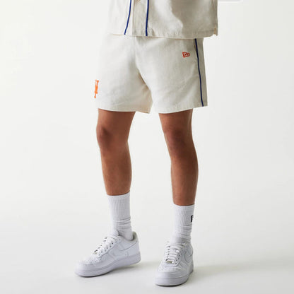 The Male model is wearing New York Mets MLB Piping Open Cream Shorts 8