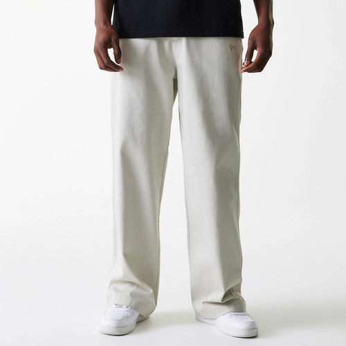 The Male model is wearing New York Yankees MLB Light Beige Chino Trousers 1