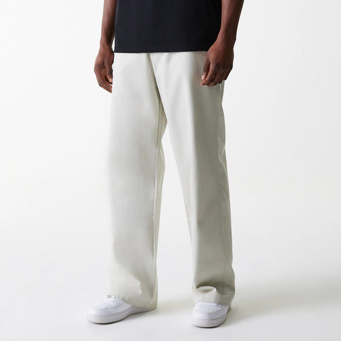 The Male model is wearing New York Yankees MLB Light Beige Chino Trousers 3