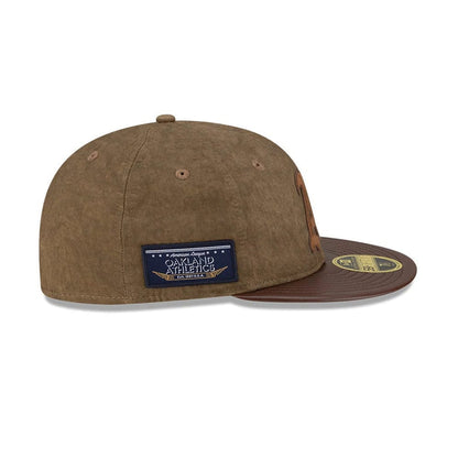 Pictured is this MLB Utility Linen Oakland Athletics Retro Crown 59FIFTY Fitted cap in open brown. 5